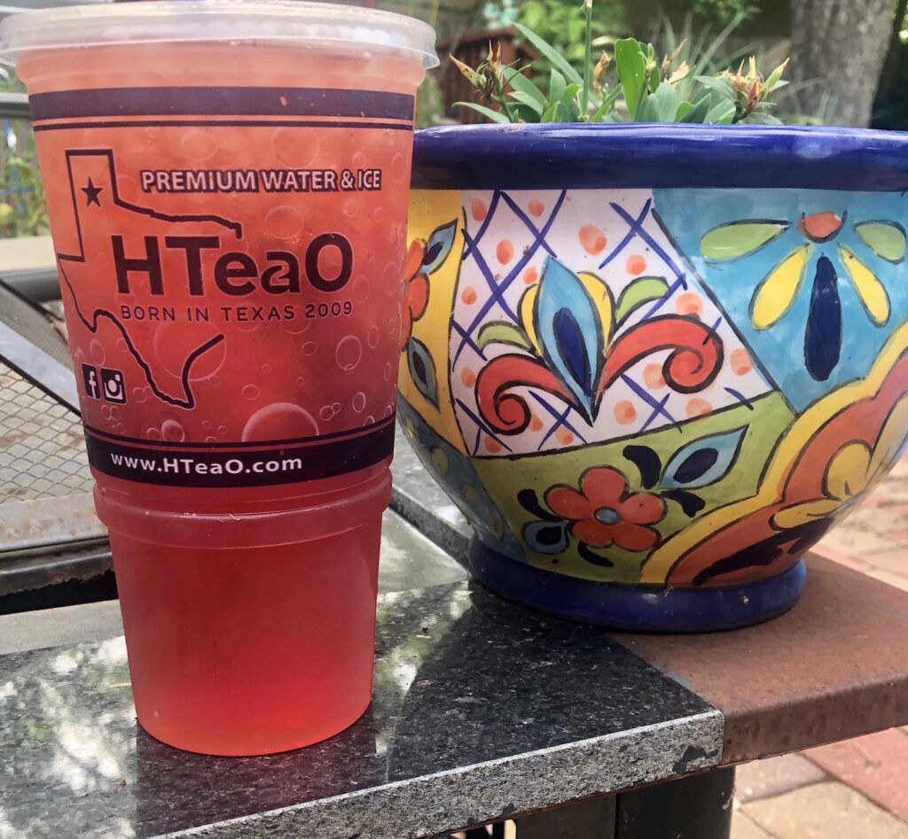 HTeaO unsweet Raspberry Tea with blueberries and a colorful flower pot